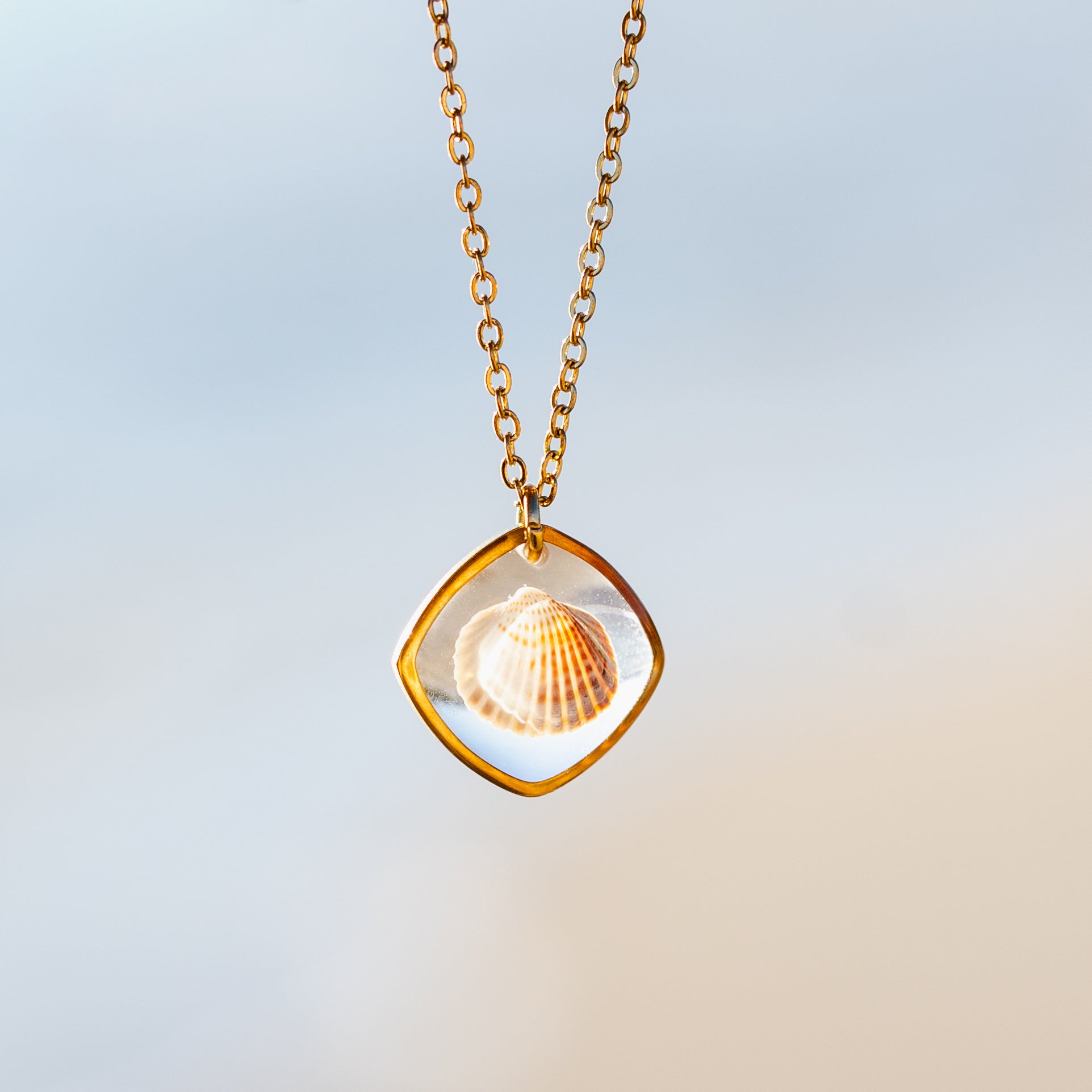 Halskette mit Herzmuschel - Gold