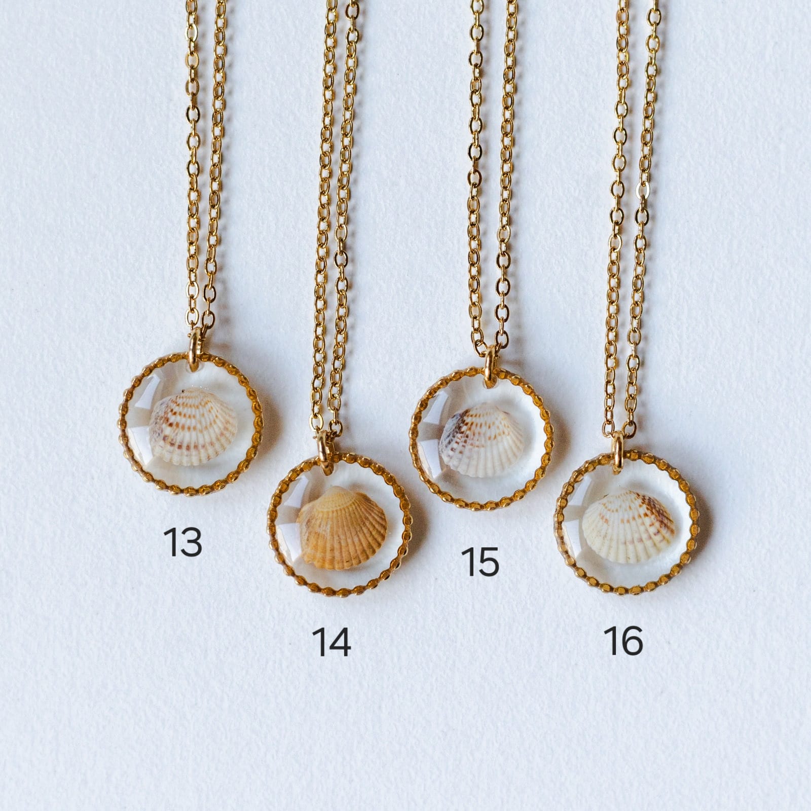 Halskette mit Herzmuschel - Gold