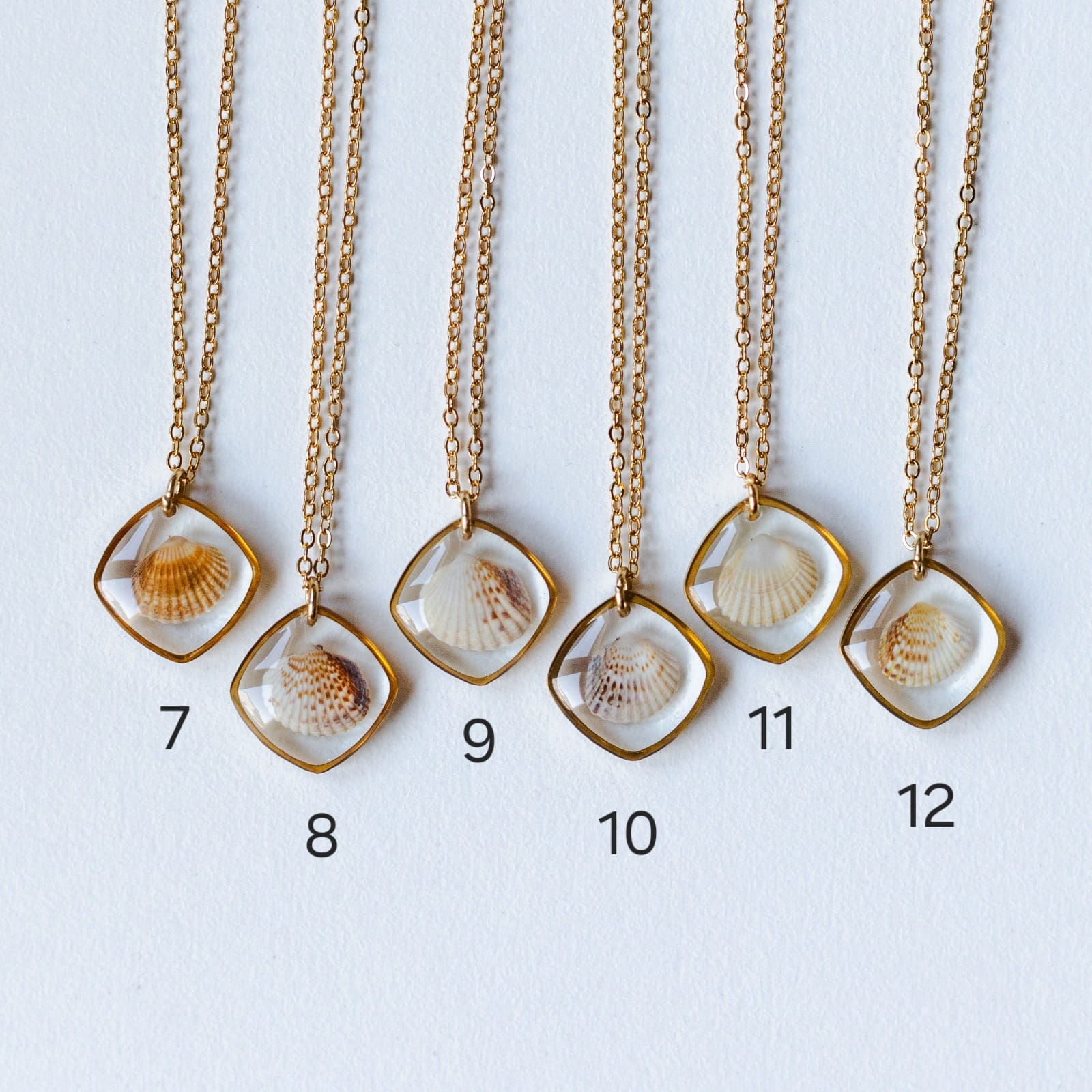 Halskette mit Herzmuschel - Gold