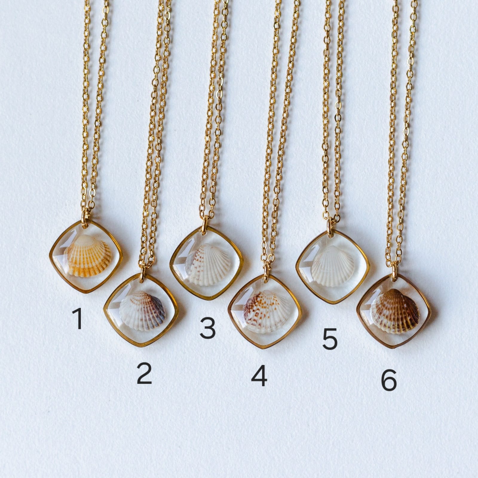 Halskette mit Herzmuschel - Gold