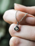 Necklace with tiny flower