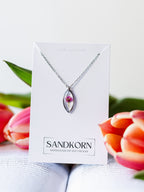 Silberne Halskette mit einer pinken Blüte | Epoxidharz Schmuck
