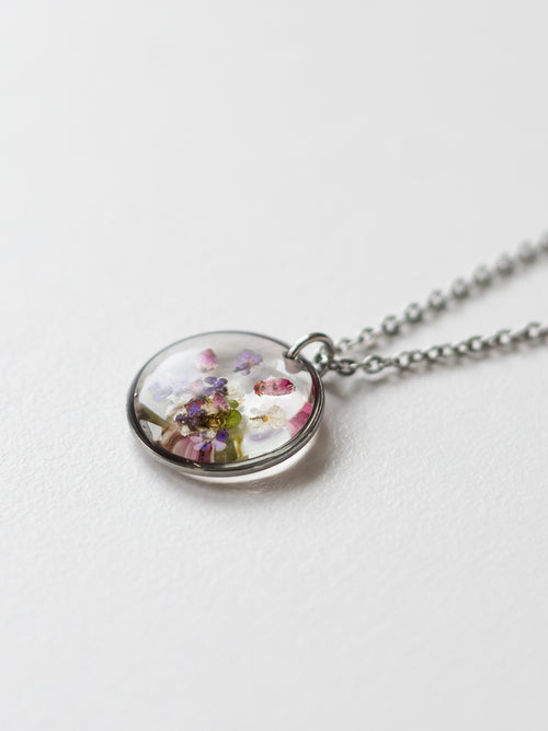 Necklace with paw made from real flowers