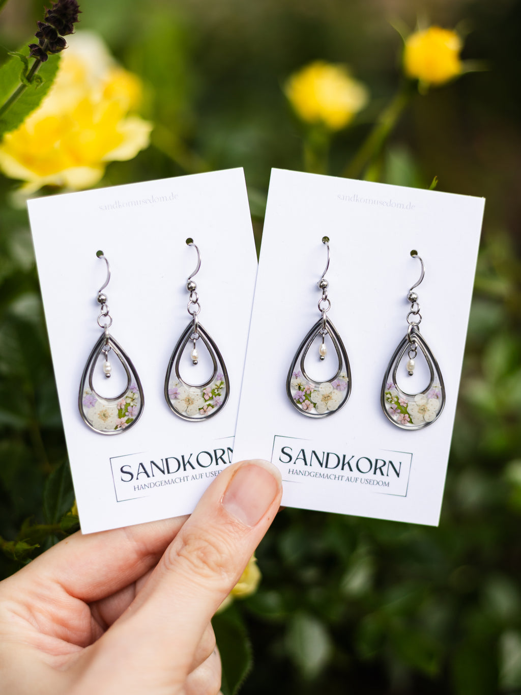 Earrings with spiraea, wild carrot and freshwater pearls