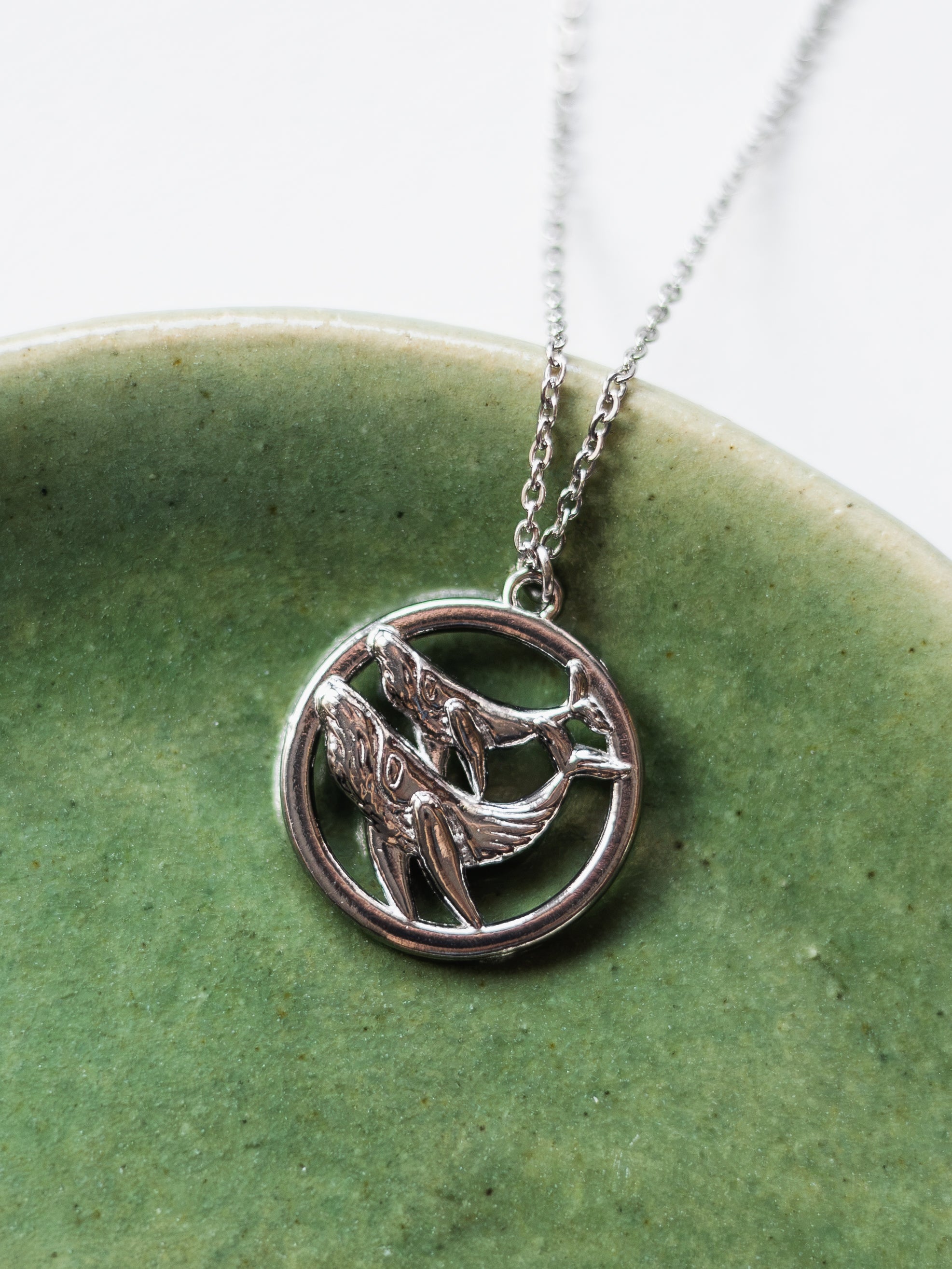 Necklace with two humpback whales