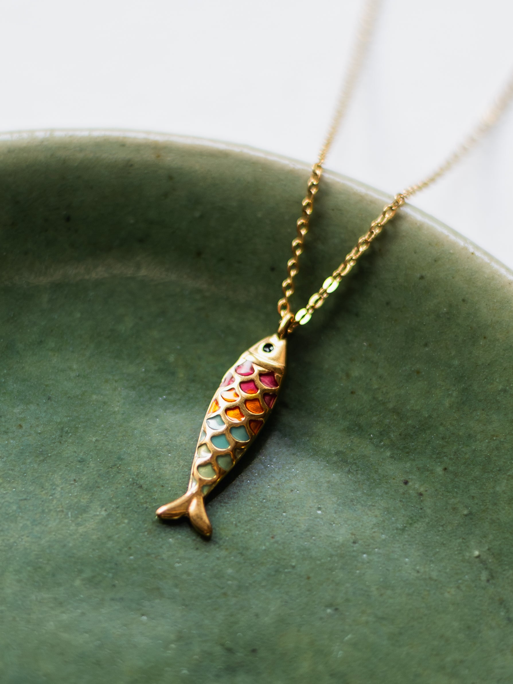 Necklace with colorful fish
