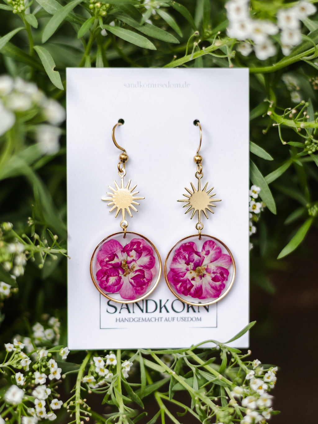 Ohrringe mit Sonnen und Rosen