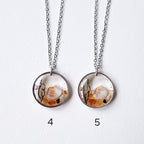 Naszyjnik w kształcie serca z piaskiem plażowym i bursztynem