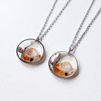 Naszyjnik w kształcie serca z piaskiem plażowym i bursztynem