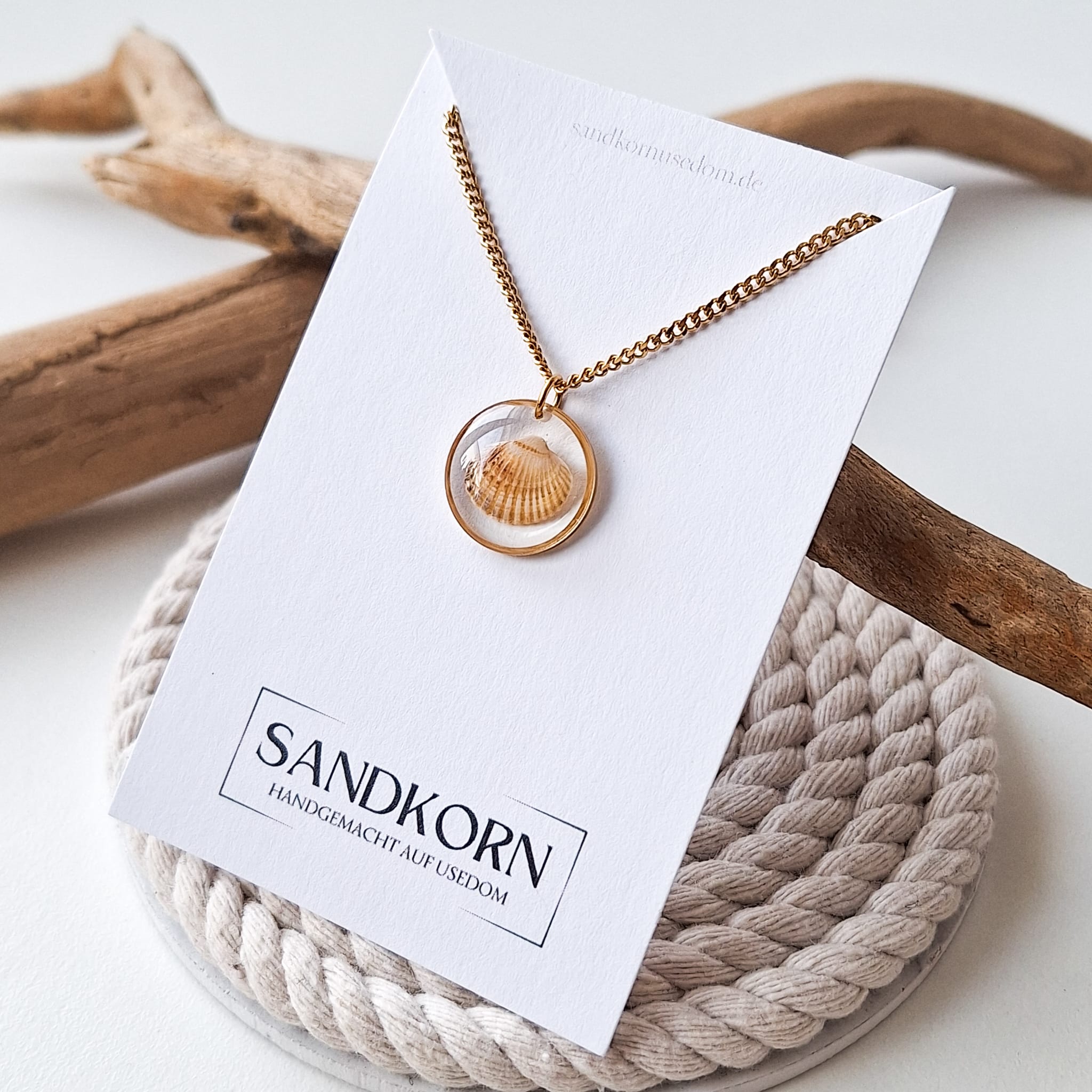 Halskette mit Herzmuschel - Gold