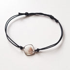 Bransoletka z muszlą w kształcie serca - srebrna