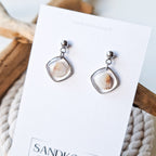 Ohrringe mit Herzmuscheln - Silber