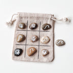Tic-Tac-Toe-Spiel mit bemalten Ostsee-Steinen - SANDKORN Usedom 