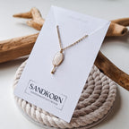 Halskette mit Sandklaffmuschel und Süßwasserperle
