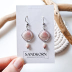 Earrings with seashells and freshwater pearls