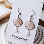 Earrings with seashells and freshwater pearls