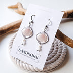 Earrings with seashells and freshwater pearls