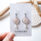 Earrings with seashells and freshwater pearls