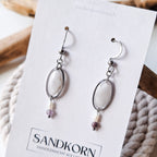 Earrings with cockle shells and freshwater pearls