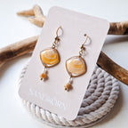 Earrings with seashells and freshwater pearls