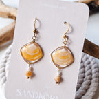 Earrings with seashells and freshwater pearls