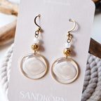 Earrings with seashells and freshwater pearls