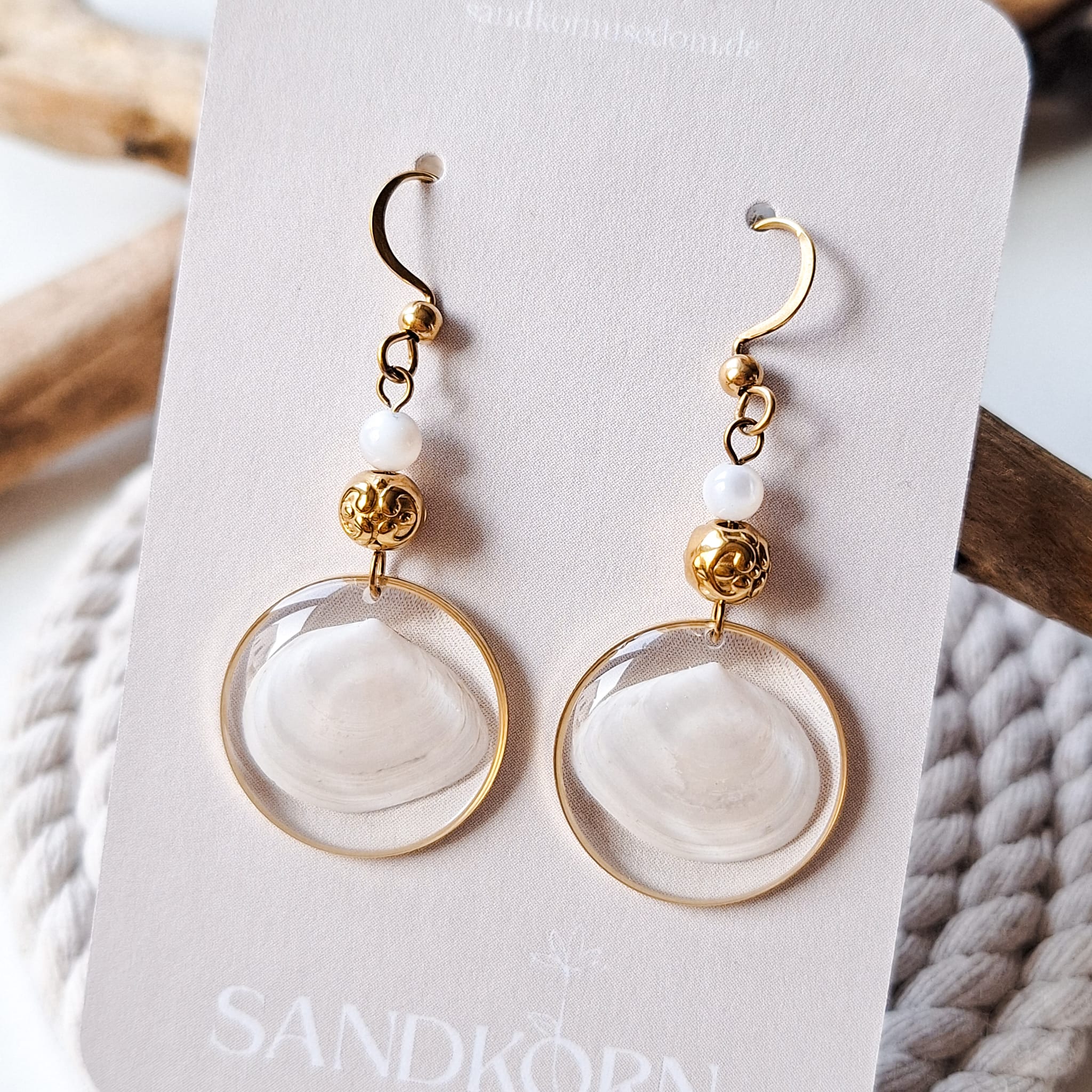 Earrings with seashells and freshwater pearls