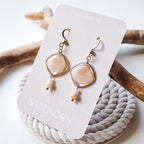 Earrings with seashells and freshwater pearls