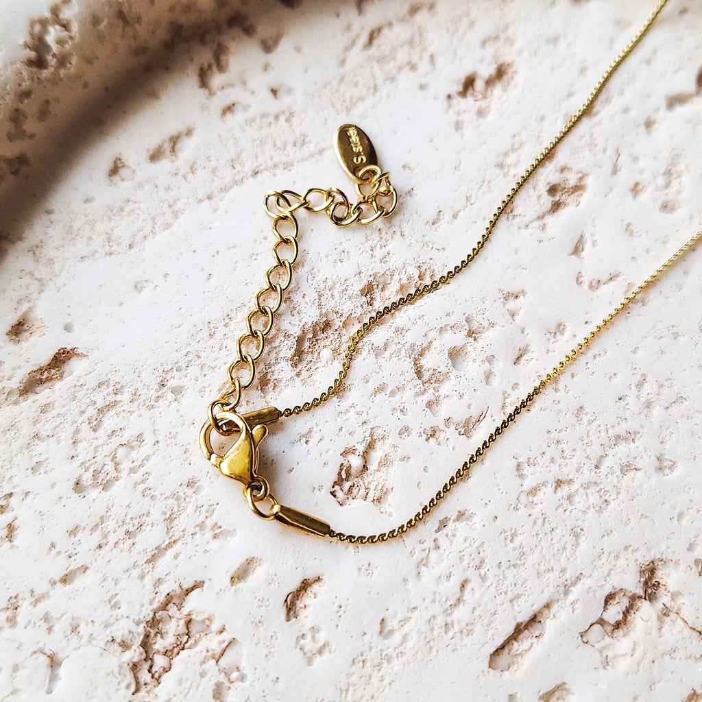 Halskette mit Herzmuschel - Gold