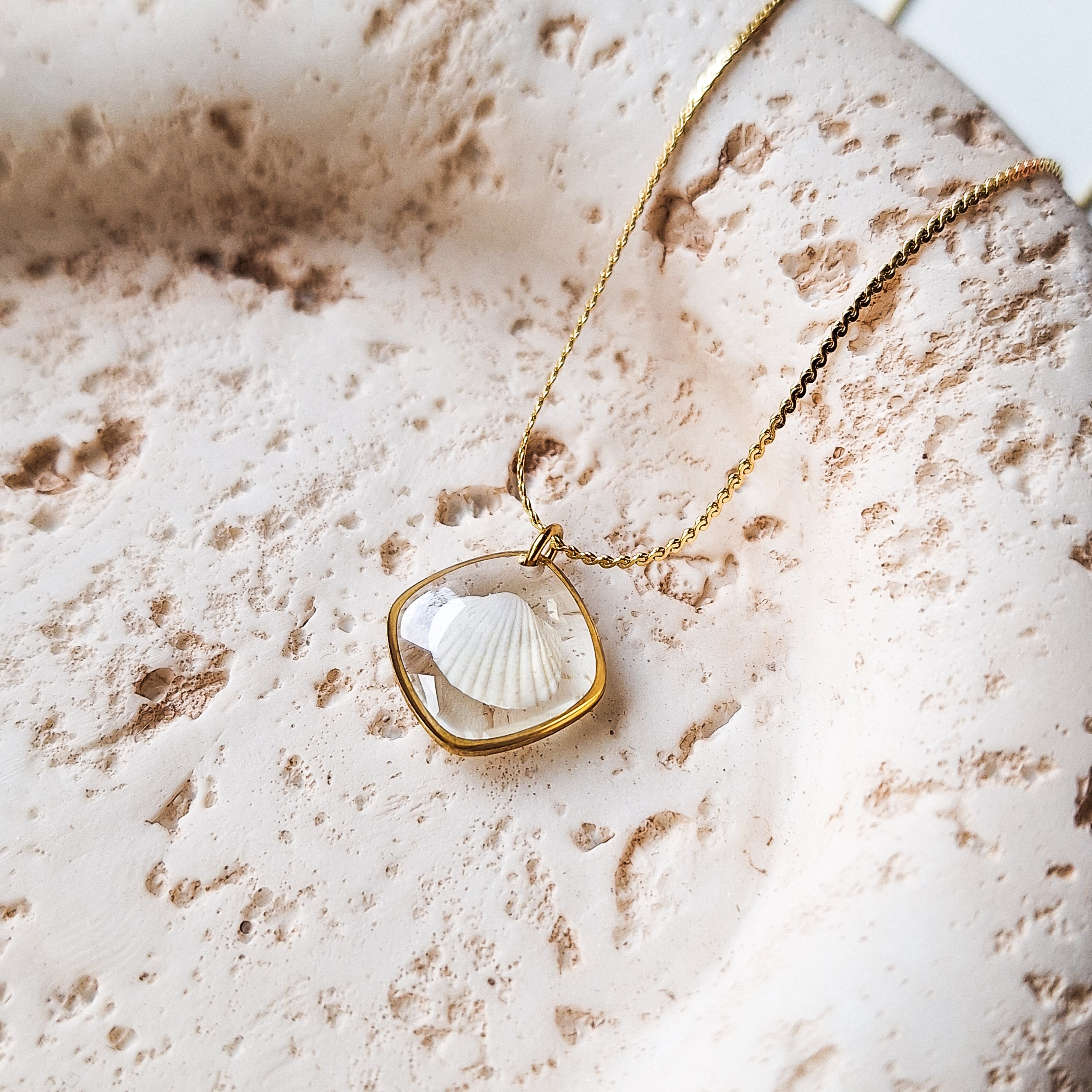 Halskette mit Herzmuschel - Gold